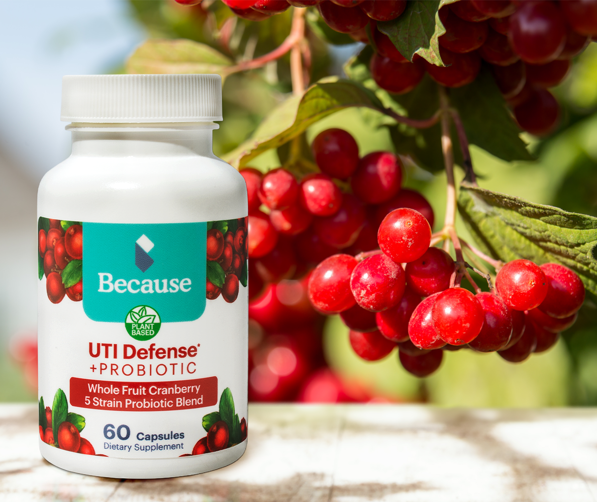 UTI Defense Package with cranberries in the background