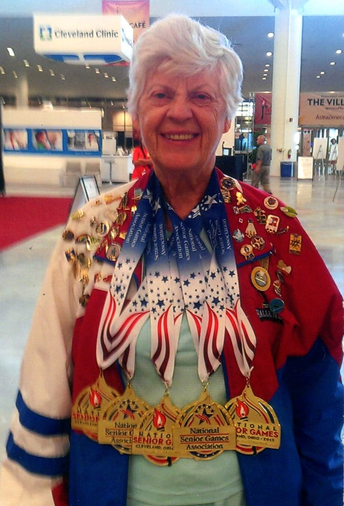 Joyce Jones poses with the 5 gold medals she won during the 2015 National Senior Olympics.