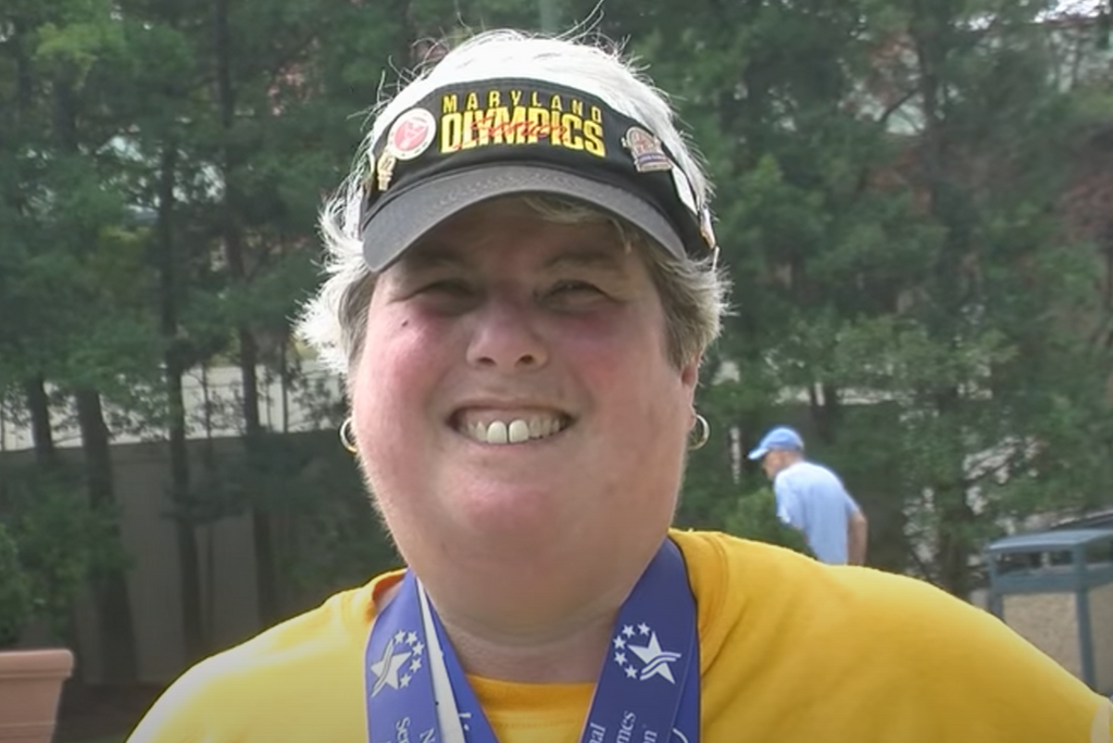 Beth Wheeler smiles with her medals.