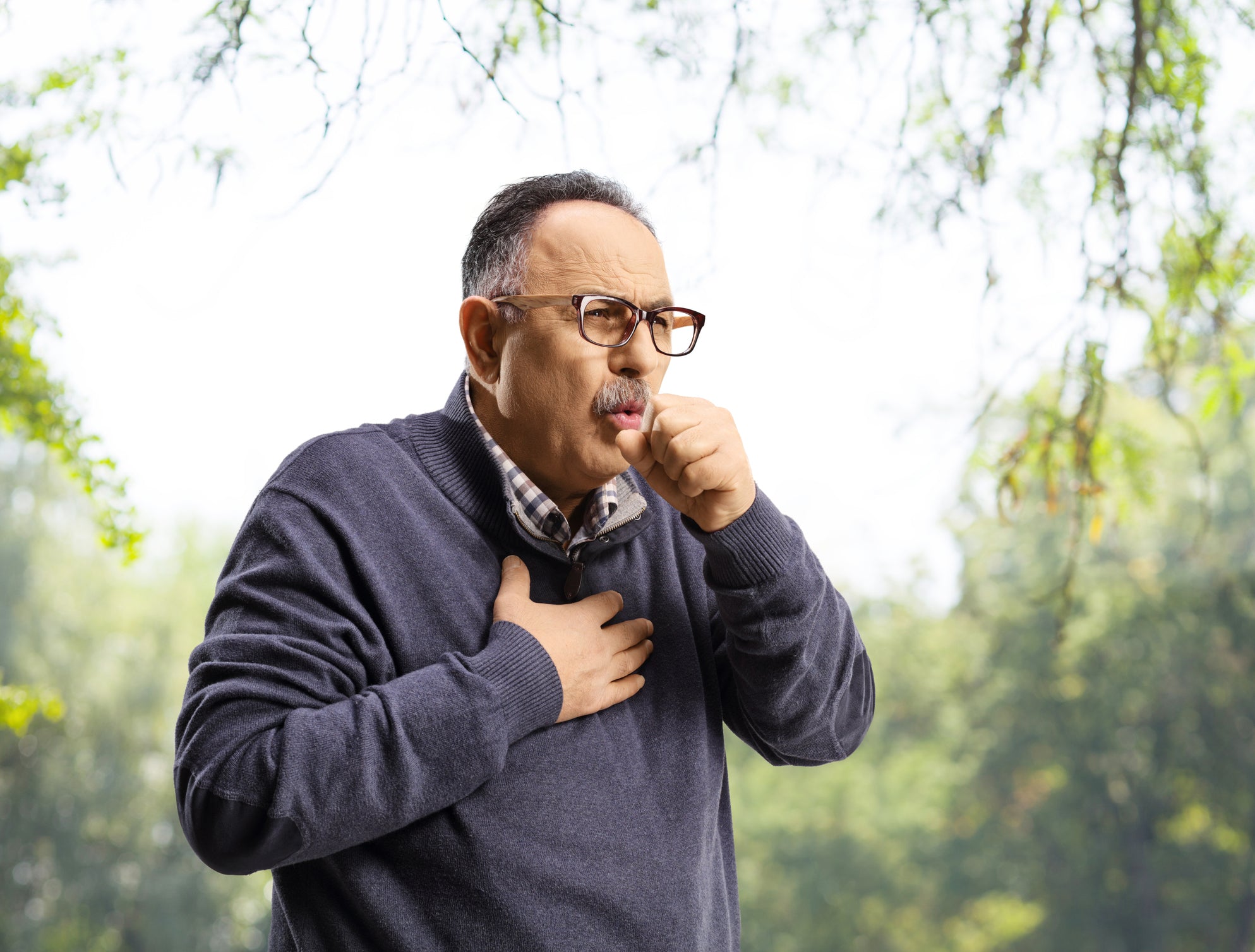 A man coughing.