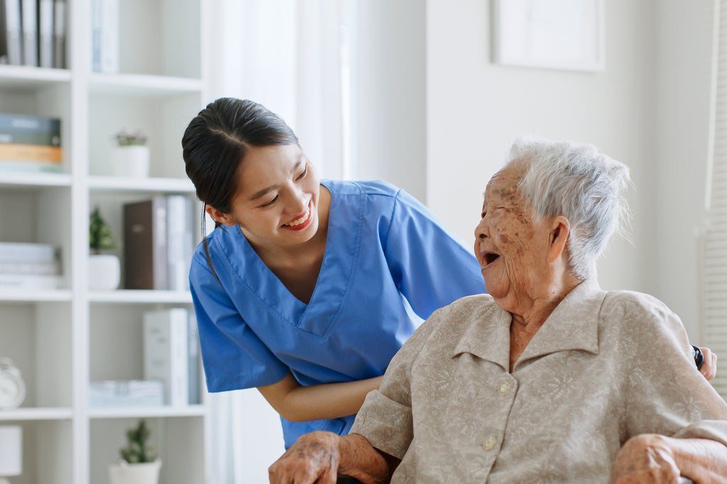 Home health aid with older woman