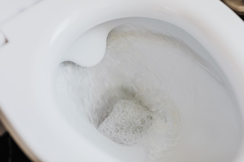 A toilet being flushed.