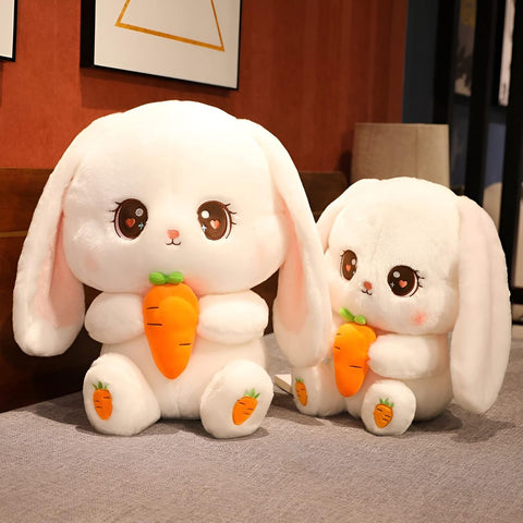 Cute plushie bunnies with carrots.