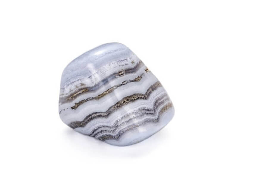 Blue lace agate burnished stone on white background