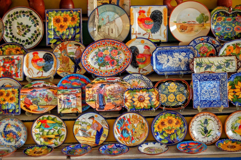 Alentejo pottery plates lined up in a store