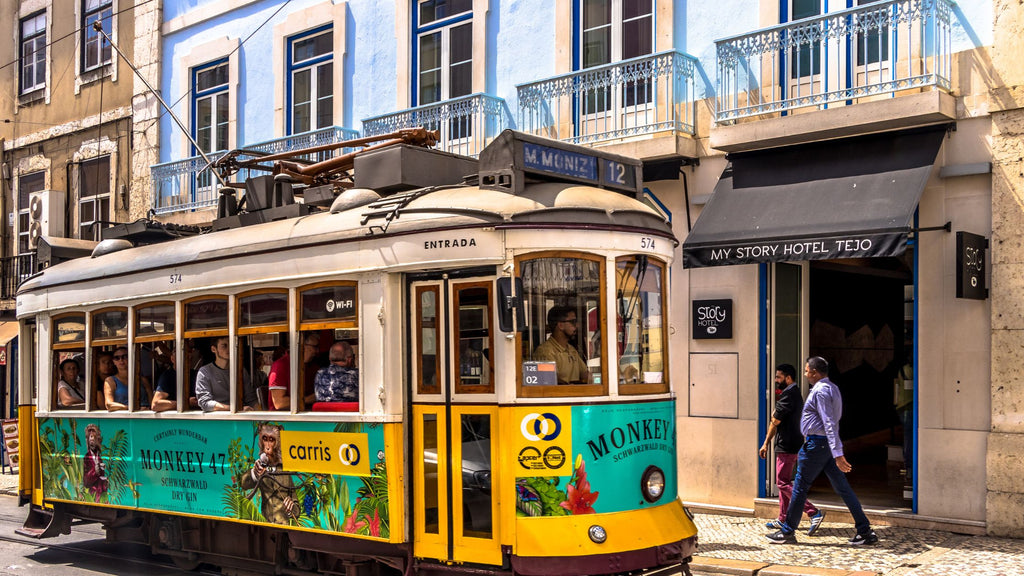 Lisbon tram on an cobbled city street