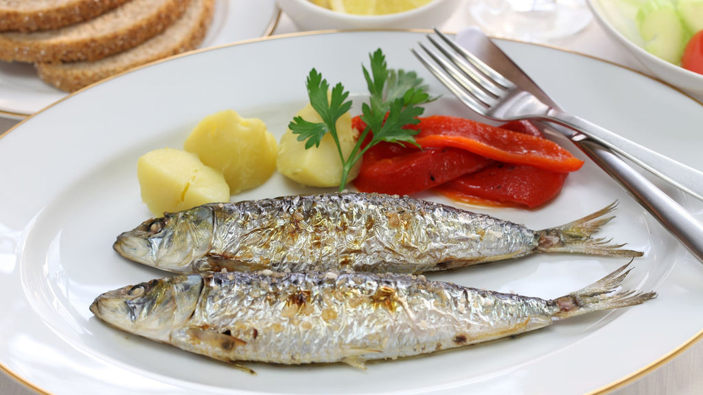 Portuguese Grilled sardines on a plate