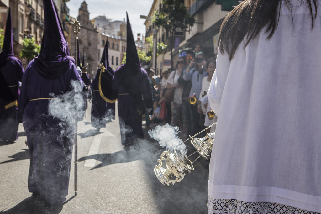 Incense burning during a Semana Santa procession in Spain