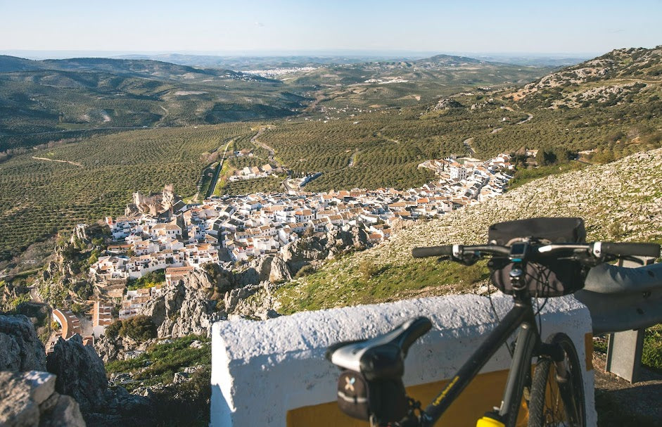 Hilltop view looking down on an Andalucian pueblo blanco