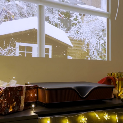 Projecting a crackling fireplace onto the wall with the P2000 ultra short throw projector