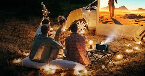 Some friends enjoying an outdoor movie night with the X300 portable camping projector.