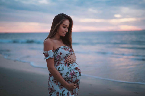 Pregnant woman at beach