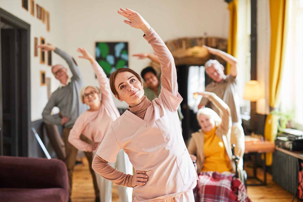 Elderly taking a yoga class.