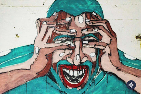 Colorful mural of a men suffering with anxiety