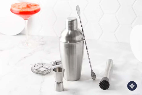 CBD Cocktail Recipes Image: Stainless steel bartending tools; mixer, bar spoon, and shot pourer.