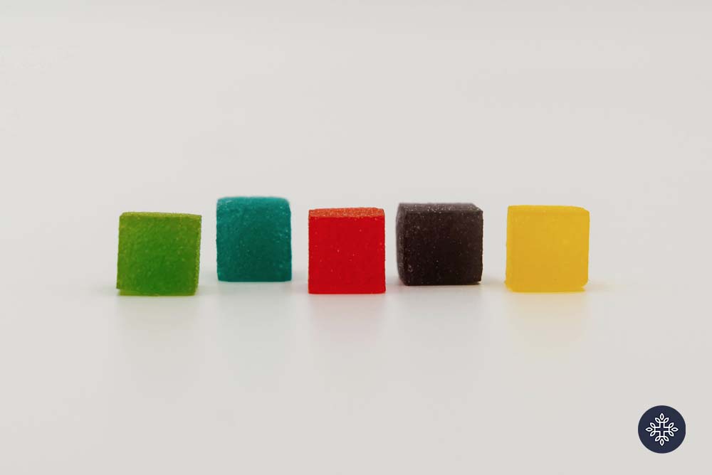 5 colorful CBD gummies lined up