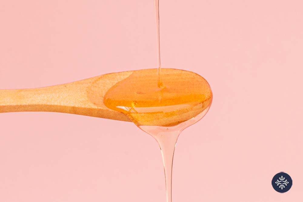 Honey on a wooden spoon