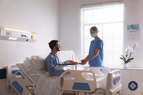 man and nurse on a hospital room