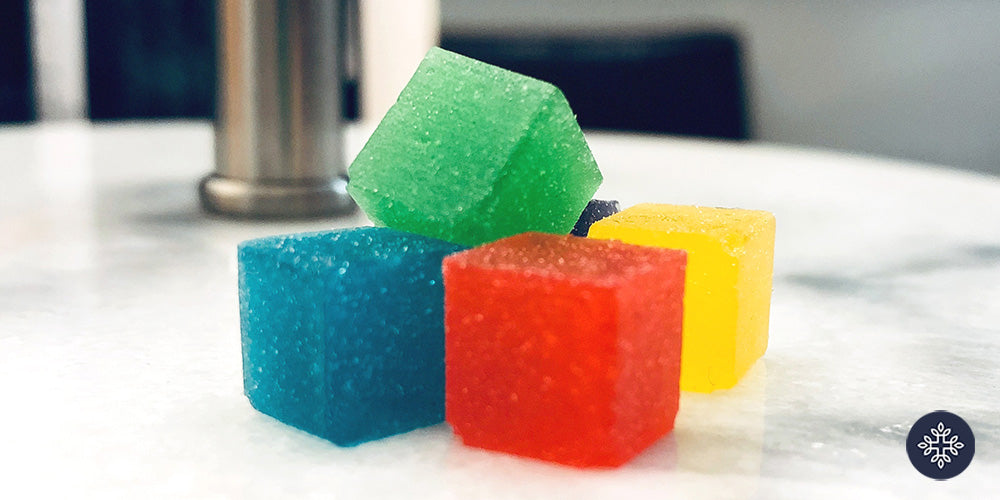 Colorful gummy squares piled