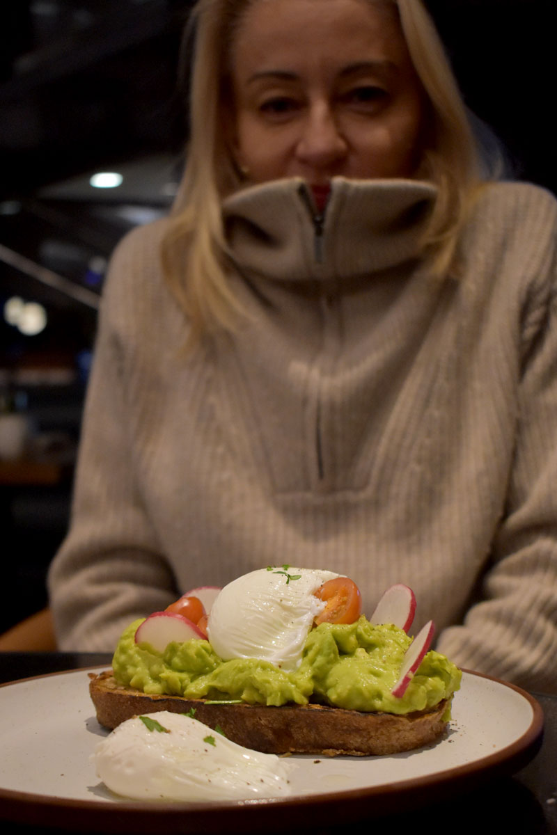 smashed avocado on sour bread