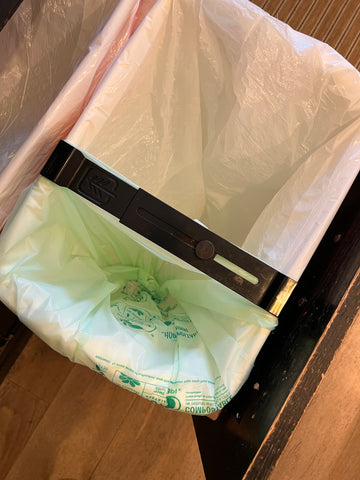 small compostable bag inside trash bag, divided by Eco-Sorter