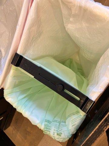 compostable bag inside trash bag, divided by Eco-Sorter