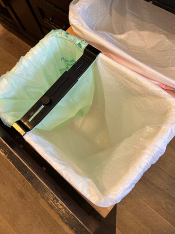 small compostable bag inside trash bag, divided by Eco-Sorter