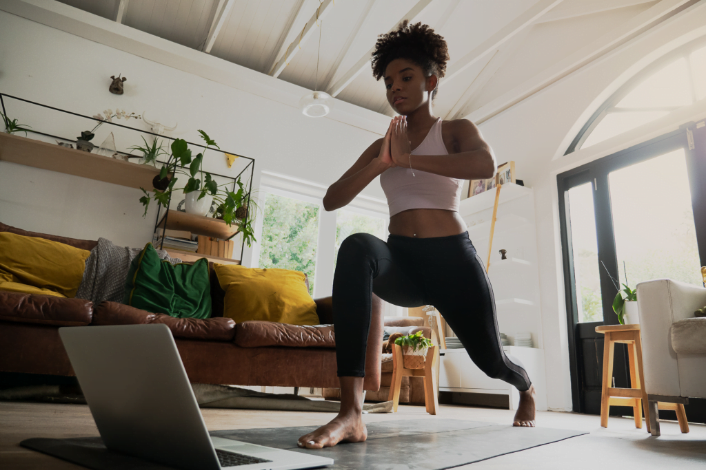 Woman doing yoga during her healthy morning routine