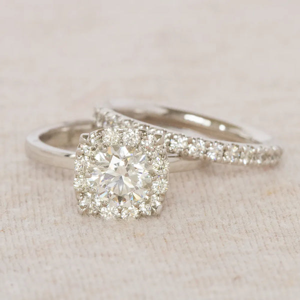 Hearts on fire engagement ring and band
