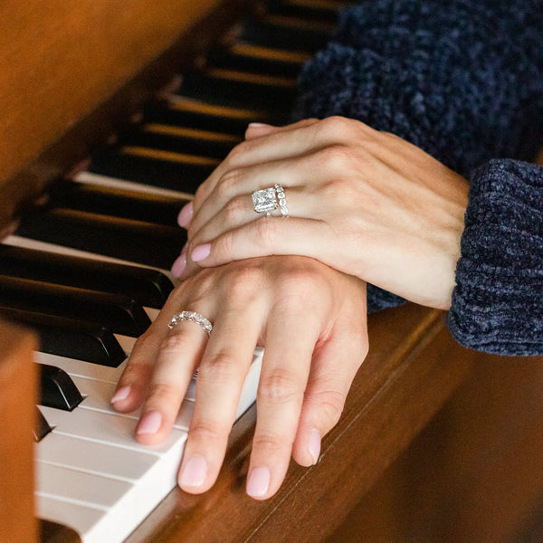 Diamond engagement ring and two diamond bands