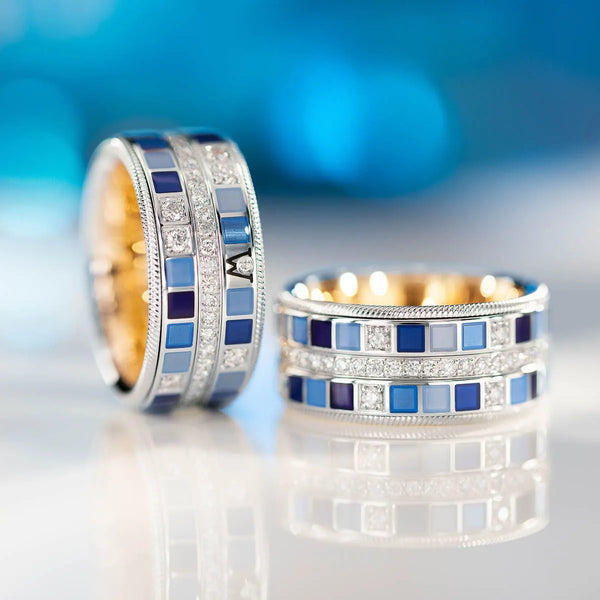 Blue gemstone and diamond Wellendorf bands