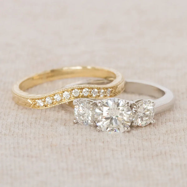 Diamond engagement ring and yellow gold diamond band