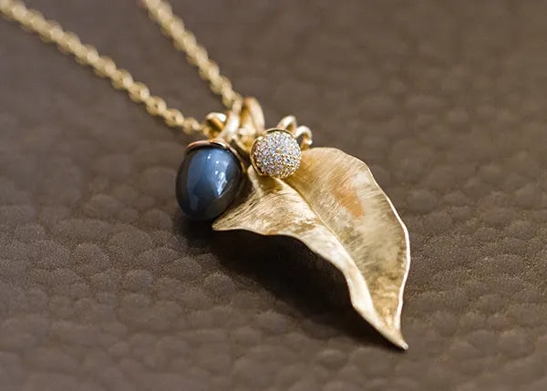 Leaf and acorn pendant