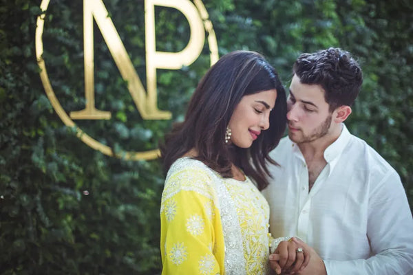 Nick Jonas with his wife and their engagement