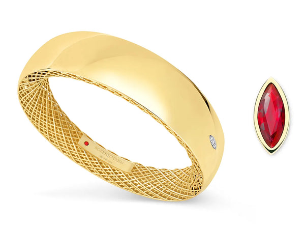 Roberto Coin gold band showing ruby inside