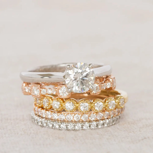 Diamond solitaire ring and diamond bands stacked