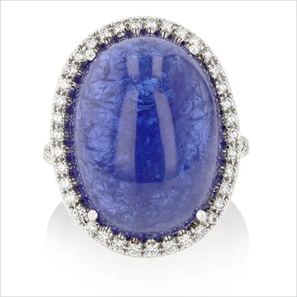 Cushion cut blue gemstone and diamond ring