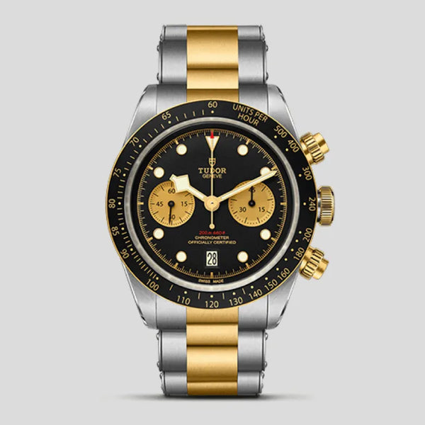 Mens gold and black watch