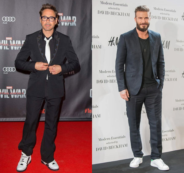 Robert Downey Jr e David Beckham indossano sneakers sotto ad un abito