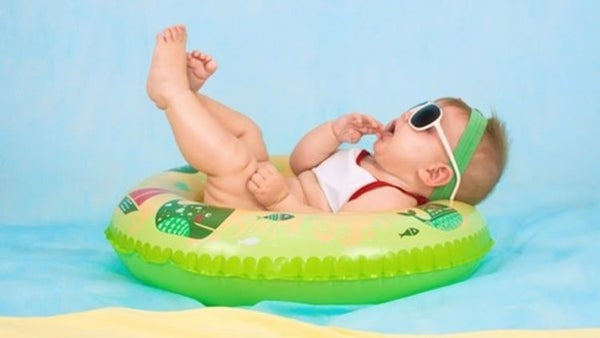 Baby girl in floaty
