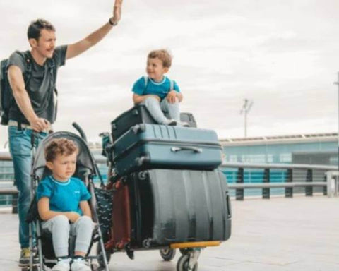 Dad with kids and alot of luggage