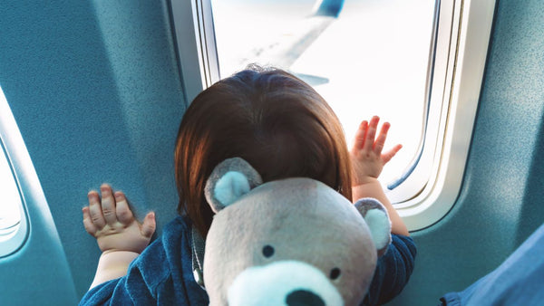 10 Items That Make Flying Alone With Kids Less Stressful