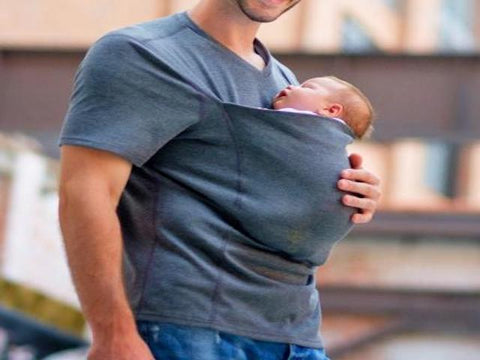 baby in baby carrier for travel with dad