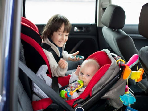 Child in FAA approved car seat
