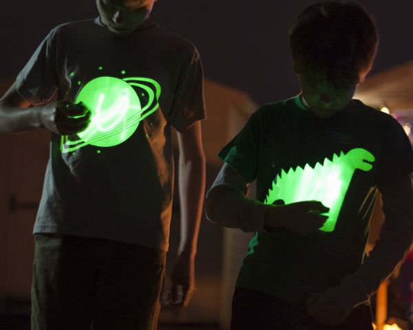 Kids with glow in the dark shirts