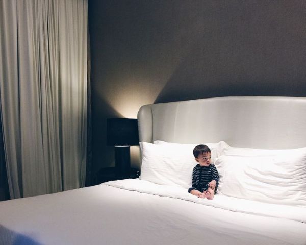 Little boy in hotel room