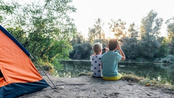kids camping in the woods