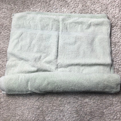 Envelopper dans la serviette