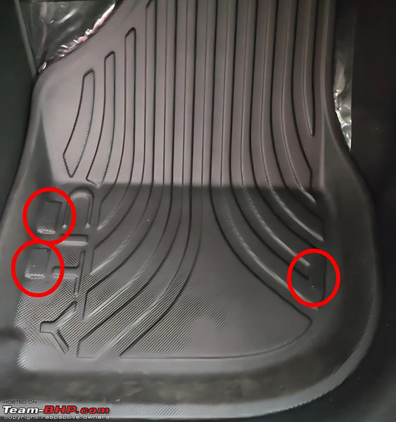 Start with the driver’s side mat. Place it in the footwell, aligning it carefully with pedals and floor contours.