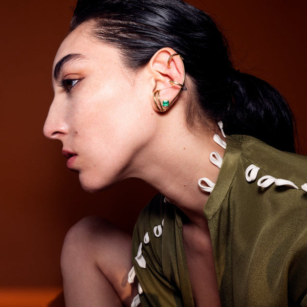 GOLDEN RINGS AND EMERALD EAR CUFF – PAULA MENDOZA FINE JEWELRY